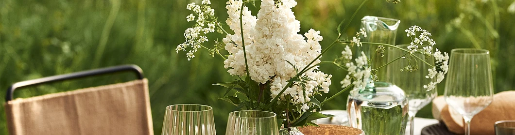 garden-party-inspiration-table-setting-beige-green-flowers-mateus-string-lights-outdoor-orchard garden-party-inspiration-table-setting-beige-green-flowers-mateus-string-lights-outdoor-orchard